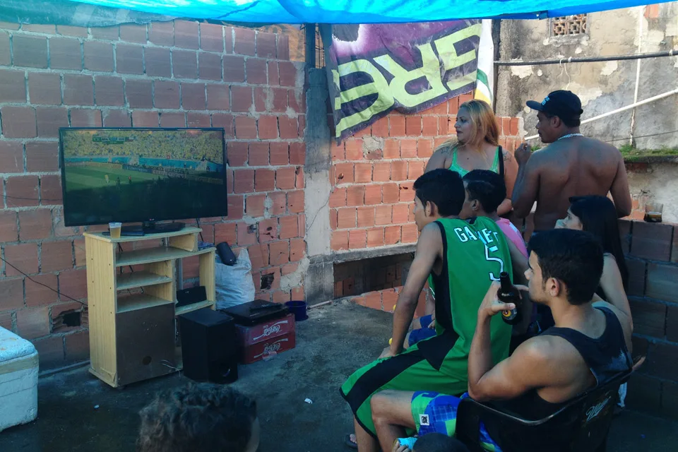 A rooftop barbecue with friends and family to celebrate the game